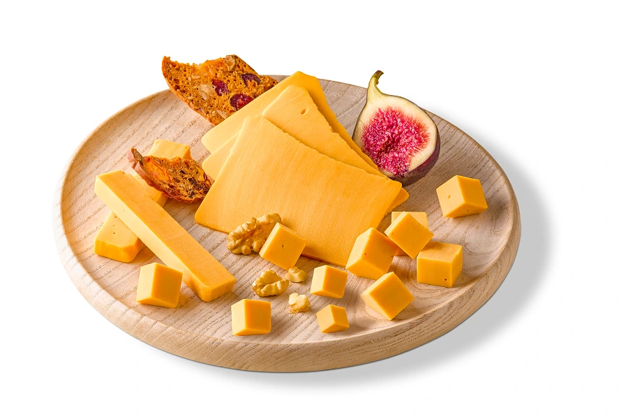 plant based cheese slices and cubes on round plate